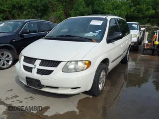2002 Dodge Caravan Sport with VIN 2B4GP44382R741363, listed as a IAAI auction lot 42141905 with 204,793 mi miles and . Bid and sale history available at carsss.com. Image 2.