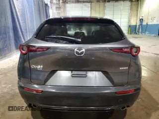 2023 Mazda CX-30 S Premium with VIN 3MVDMBDM4PM526295, listed as a Copart auction lot 88983565 with 54,991 mi miles and Non Repairable. Bid and sale history available at carsss.com. Image 6.