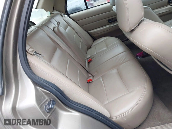 2003 Ford Crown Victoria LX z VIN 2FAFP74W13X120754, wystawiony jako IAAI lot #42212879 z przebiegiem 91 438 mil mil oraz . Historia ofert i sprzedaży dostępna na DreamBid. Obrazek 8.