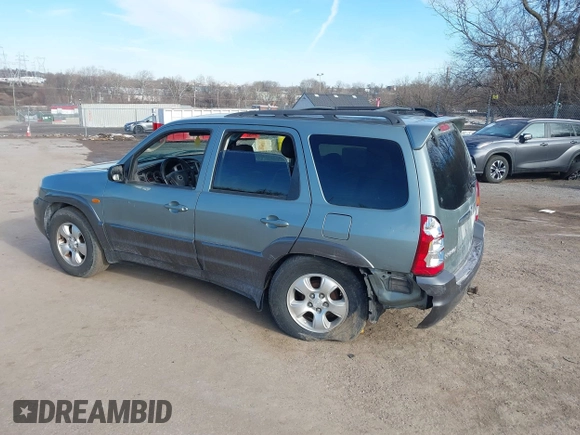 2003 Mazda Tribute ES with VIN 4F2CZ96133KM29066, listed as a IAAI auction lot 41581210 with 265,586 mi miles. Bid and sale history available at carsss.com. Image 3.