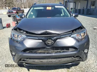 2018 Toyota RAV4 XLE with VIN 2T3WFREV7JW470850, listed as a Copart auction lot 49522265 with 102,029 mi miles and Salvage Title. Bid and sale history available at carsss.com. Image 5.