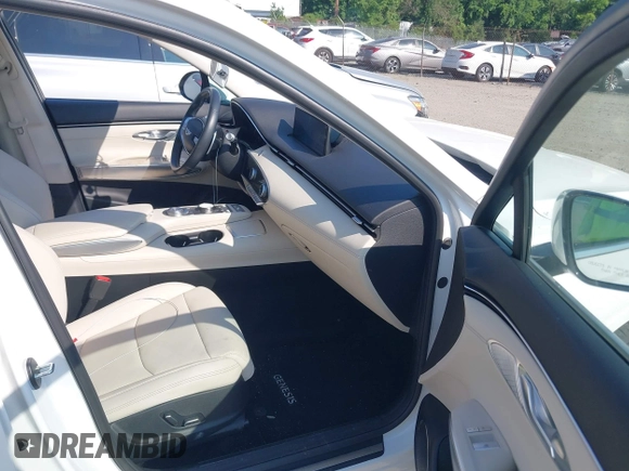 2023 Genesis GV70 2.5T with VIN KMUMADTB6PU096929, listed as a IAAI auction lot 42554427 with 73,553 mi miles and . Bid and sale history available at DreamBid. Image 5.