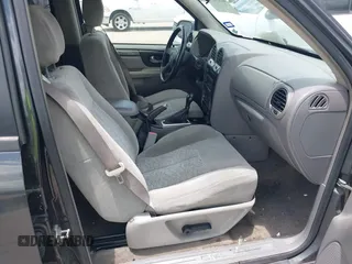 2005 GMC Envoy SLE with VIN 1GKDS13SX52373187, listed as a IAAI auction lot 42434190 with 112,965 mi miles and . Bid and sale history available at DreamBid. Image 5.