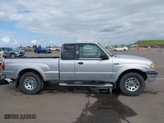 2003 Mazda B-Series 4WD Truck with VIN 4F4ZR47E63TM06204, listed as a IAAI auction lot 41895935 with 259,901 mi miles. Bid and sale history available at carsss.com. Image 14.