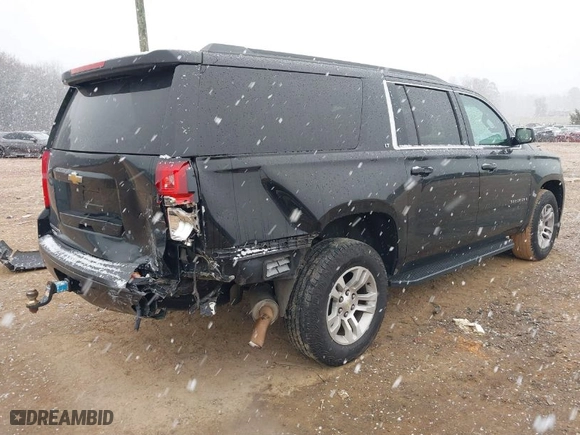 2016 Chevrolet Suburban LT with VIN 1GNSKHKC9GR112933, listed as a IAAI auction lot 41618685 with 188,921 mi miles. Bid and sale history available at carsss.com. Image 4.