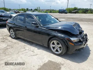 2014 BMW 3 Series 320i xDrive with VIN WBA3C3G51ENS72023, listed as a Copart auction lot 58595225 with 104,315 mi miles and Salvage title. Bid and sale history available at DreamBid. Image 4.