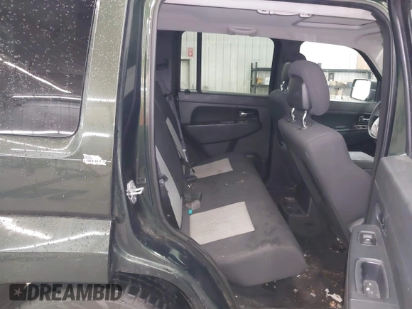 2010 Jeep Liberty Sport with VIN 1J4PN2GKXAW166781, listed as a IAAI auction lot 42301262 with 117,798 mi miles and . Bid and sale history available at DreamBid. Image 8.