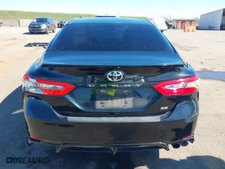 2018 Toyota Camry LE with VIN JTNB11HKXJ3071137, listed as a IAAI auction lot 41699856 with 102,310 mi miles. Bid and sale history available at carsss.com. Image 16.