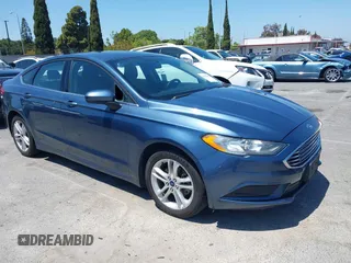 2018 Ford Fusion SE z VIN 3FA6P0H71JR140685, wystawiony jako IAAI lot #42149380 z przebiegiem 176 558 mil mil oraz . Historia ofert i sprzedaży dostępna na DreamBid. Obrazek 1.