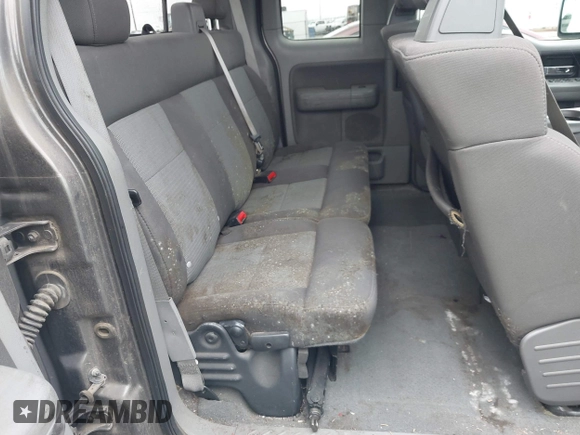 2005 Ford F-150 STX with VIN 1FTRX12W65NA60997, listed as a IAAI auction lot 41836976 with 170,400 mi miles. Bid and sale history available at carsss.com. Image 8.