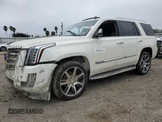 2015 Cadillac Escalade Luxury z VIN 1GYS3BKJ0FR180516, wystawiony jako Copart lot #87817045 z przebiegiem 153 628 mil mil oraz Szkoda całkowita • Salvage title. Historia ofert i sprzedaży dostępna na DreamBid. Obrazek 1.