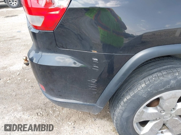 2014 Jeep Grand Cherokee Laredo with VIN 1C4RJFAG1EC315544, listed as a IAAI auction lot 42105987 with 164,430 mi miles. Bid and sale history available at carsss.com. Image 6.