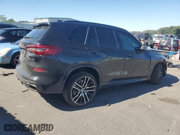2020 BMW X5 M50i with VIN 5UXJU4C05LL228167, listed as a Copart auction lot 70390194 with Not Provided miles and Salvage Title. Bid and sale history available at DreamBid. Image 3.