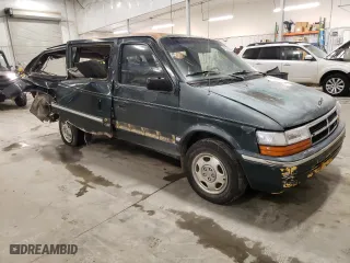 1993 Dodge Caravan Grand SE with VIN 1B4GH44R2PX757679, listed as a Copart auction lot 43034645 with 311,322 mi miles and Salvage Title. Bid and sale history available at carsss.com. Image 4.