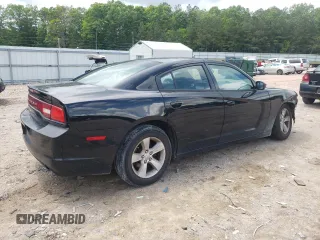 2013 Dodge Charger SE z VIN 2C3CDXBG3DH625499, wystawiony jako Copart lot #56881555 z przebiegiem 182 389 mil mil oraz Szkody całkowita. Historia ofert i sprzedaży dostępna na DreamBid. Obrazek 3.