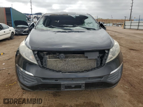 2013 Kia Sportage LX z VIN KNDPBCA25D7450010, wystawiony jako Copart lot #54597815 z przebiegiem 110 980 mil mil oraz Czysty tytuł • Clean title. Historia ofert i sprzedaży dostępna na DreamBid. Obrazek 5.