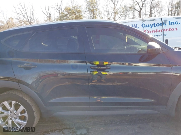 2019 Hyundai Tucson Value with VIN KM8J33A4XKU979791, listed as a IAAI auction lot 41255630 with 90,807 mi miles. Bid and sale history available at carsss.com. Image 13.