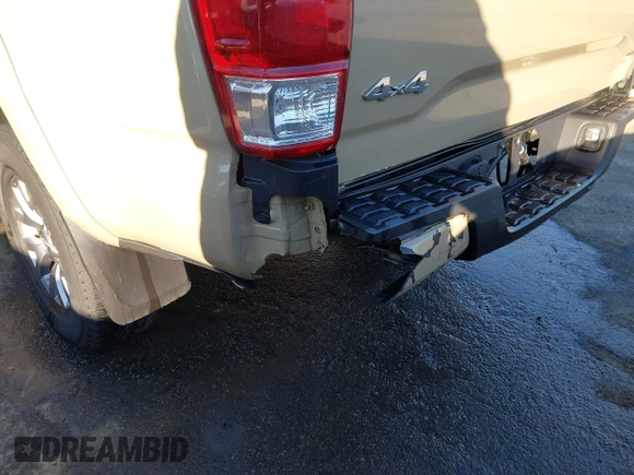 2017 Toyota Tacoma SR5 with VIN 3TMCZ5ANXHM088347, listed as a IAAI auction lot 41591318 with 103,800 mi miles and . Bid and sale history available at DreamBid. Image 6.
