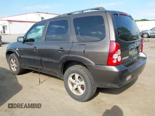 2006 Mazda Tribute LX with VIN 4F2YZ94136KM23037, listed as a IAAI auction lot 42220090 with 144,039 mi miles and . Bid and sale history available at carsss.com. Image 3.