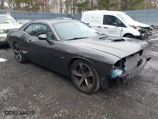 2015 Dodge Challenger R/T with VIN 2C3CDZAT9FH782760, listed as a IAAI auction lot 41531276 with 76,957 mi miles. Bid and sale history available at carsss.com. Image 1.