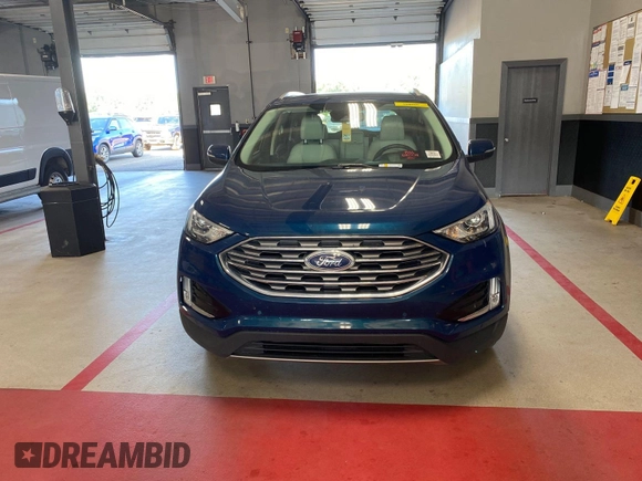 2020 Ford Edge Titanium z VIN 2FMPK3K91LBB37761, wystawiony jako IAAI lot #42829390 z przebiegiem 90 117 mil mil oraz . Historia ofert i sprzedaży dostępna na DreamBid. Obrazek 4.