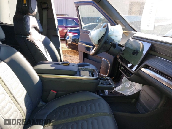 2022 Rivian R1T Adventure Package with VIN 7FCTGAAA2NN006098, listed as a IAAI auction lot 41172815 with 1 mi miles. Bid and sale history available at carsss.com. Image 5.