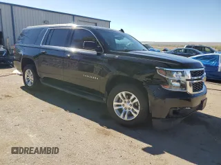 2019 Chevrolet Suburban LS with VIN 1GNSCGKC6KR180042, listed as a Copart auction lot 76829394 with 75,574 mi miles and Salvage title. Bid and sale history available at DreamBid. Image 4.