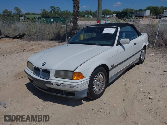 1995 BMW 3 Series 325iC with VIN WBABJ632XSJD40243, listed as a IAAI auction lot 41838410 with 199,909 mi miles. Bid and sale history available at carsss.com. Image 2.