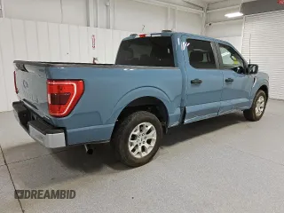 2023 Ford F-150 XL with VIN 1FTEW1C89PKE14033, listed as a Copart auction lot 58328605 with 53,902 mi miles and Clean title. Bid and sale history available at DreamBid. Image 3.