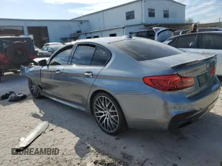 2018 BMW 5 Series M550i xDrive with VIN WBAJB9C53JB034947, listed as a Copart auction lot 77270534 with Not provided miles and Non repairable. Bid and sale history available at DreamBid. Image 2.