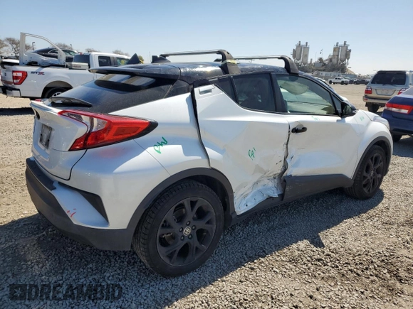 2022 Toyota C-HR XLE with VIN JTNKHMBX4N1130766, listed as a Copart auction lot 50050755 with 119,736 mi miles and Salvage Title. Bid and sale history available at DreamBid. Image 3.