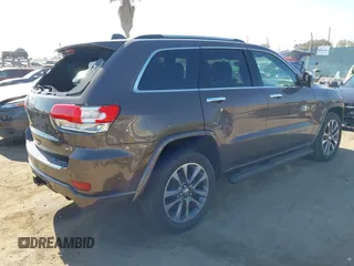 2017 Jeep Grand Cherokee Overland z VIN 1C4RJECG0HC960178, wystawiony jako IAAI lot #42315844 z przebiegiem 63 271 mil mil oraz . Historia ofert i sprzedaży dostępna na DreamBid. Obrazek 4.
