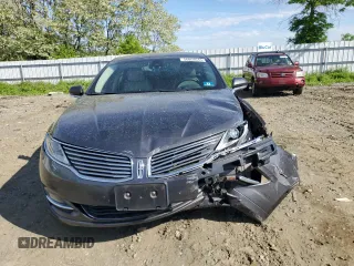 2016 Lincoln MKZ z VIN 3LN6L2JK1GR626675, wystawiony jako Copart lot #56068645 z przebiegiem 94 068 mil mil oraz Szkoda całkowita • Salvage title. Historia ofert i sprzedaży dostępna na DreamBid. Obrazek 5.