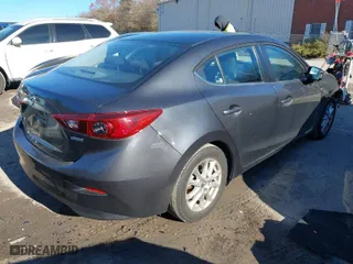 2016 Mazda Mazda3 i Sport with VIN JM1BM1U77G1327090, listed as a IAAI auction lot 41039358 with 94,107 mi miles. Bid and sale history available at carsss.com. Image 4.
