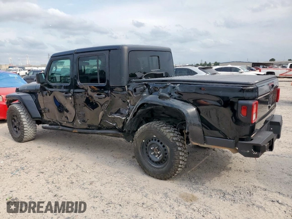 2023 Jeep Gladiator Freedom with VIN 1C6HJTAG7PL531273, listed as a Copart auction lot 56743255 with 41,226 mi miles and Salvage title. Bid and sale history available at DreamBid. Image 2.