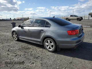 2014 Volkswagen Jetta TDI w/Premium with VIN 3VW3L7AJ4EM273755, listed as a Copart auction lot 52389795 with 184,586 mi miles and Salvage title. Bid and sale history available at DreamBid. Image 2.