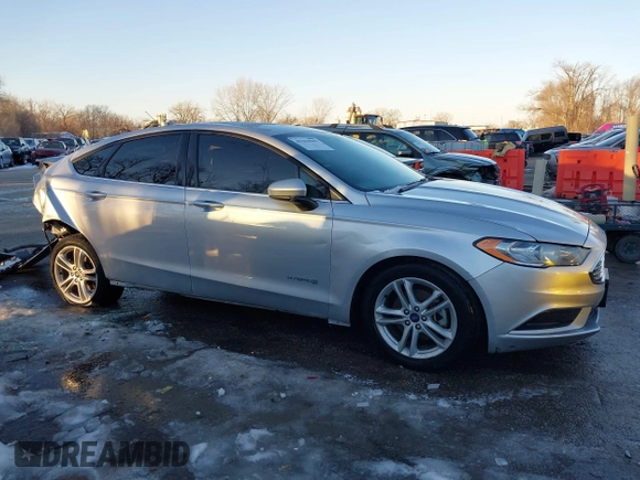 2018 Ford Fusion SE z VIN 3FA6P0LU4JR269064, wystawiony jako IAAI lot #41222967 z przebiegiem 115 077 mil mil oraz . Historia ofert i sprzedaży dostępna na DreamBid. Obrazek 14.