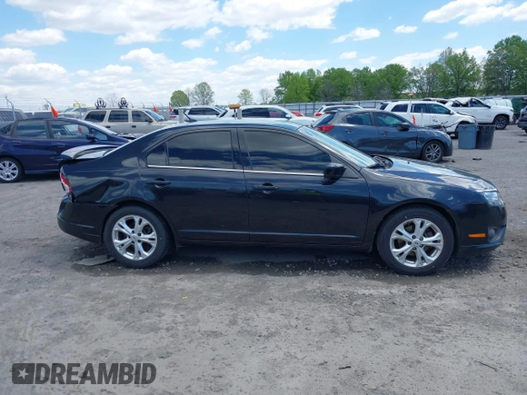 2012 Ford Fusion SE z VIN 3FAHP0HG8CR339020, wystawiony jako IAAI lot #41962046 z przebiegiem 136 072 mil mil oraz . Historia ofert i sprzedaży dostępna na DreamBid. Obrazek 13.