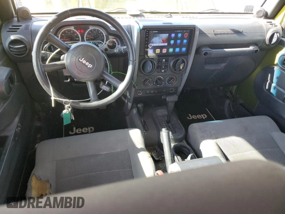 2008 Jeep Wrangler Rubicon z VIN 1J8GA69158L561579, wystawiony jako Copart lot #57525905 z przebiegiem 201 550 mil mil oraz Szkoda całkowita • Salvage title. Historia ofert i sprzedaży dostępna na DreamBid. Obrazek 8.