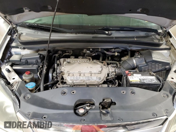 2007 Honda Odyssey Touring z VIN 5FNRL38887B102328, wystawiony jako Copart lot #52113595 z przebiegiem 105 394 mil mil oraz Szkoda całkowita • Salvage title. Historia ofert i sprzedaży dostępna na DreamBid. Obrazek 12.