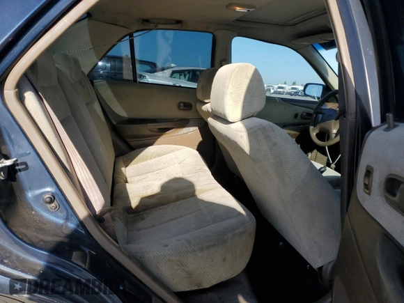 1999 Mazda Protege DX z VIN JM1BJ2227X0106522, wystawiony jako Copart lot #52423565 z przebiegiem 206 260 mil mil oraz Szkoda całkowita • Salvage title. Historia ofert i sprzedaży dostępna na DreamBid. Obrazek 10.