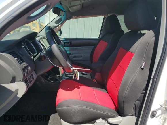 2015 Toyota Tacoma with VIN 3TMLU4EN1FM203062, listed as a Copart auction lot 60488055 with 111,994 mi miles and Salvage title. Bid and sale history available at DreamBid. Image 7.