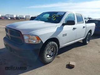 2015 Ram 1500 Tradesman with VIN 1C6RR7KG5FS660748, listed as a IAAI auction lot 41403779 with 201,127 mi miles and . Bid and sale history available at DreamBid. Image 2.