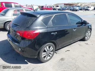 2013 Kia Forte 5-Door EX with VIN KNAFU5A28D5701290, listed as a IAAI auction lot 41837289 with 143,224 mi miles. Bid and sale history available at carsss.com. Image 4.