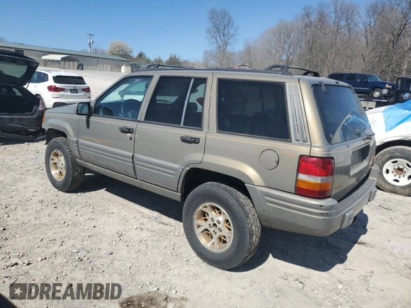 1997 Jeep Grand Cherokee Limited with VIN 1J4GZ78Y4VC567237, listed as a Copart auction lot 49059105 with 177,478 mi miles and Salvage Title. Bid and sale history available at carsss.com. Image 2.