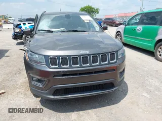 2019 Jeep Compass Latitude with VIN 3C4NJCBB1KT833007, listed as a IAAI auction lot 42401265 with 106,973 mi miles and . Bid and sale history available at DreamBid. Image 12.