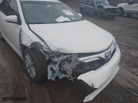 2014 Toyota Camry Hybrid LE with VIN 4T1BD1FK0EU115964, listed as a IAAI auction lot 40854548 with 61,731 mi miles. Bid and sale history available at carsss.com. Image 6.