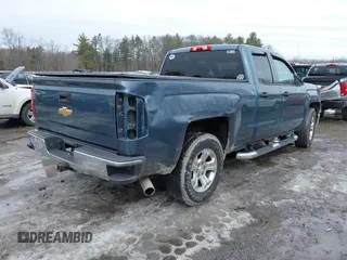 2014 Chevrolet Silverado 1500 LT with VIN 1GCVKREC3EZ192671, listed as a IAAI auction lot 41667814 with 124,292 mi miles and . Bid and sale history available at DreamBid. Image 4.