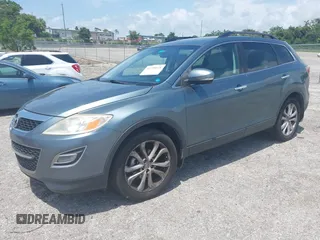 2012 Mazda CX-9 Grand Touring z VIN JM3TB2DA8C0354172, wystawiony jako IAAI lot #42739121 z przebiegiem 208 287 mil mil oraz . Historia ofert i sprzedaży dostępna na DreamBid. Obrazek 2.