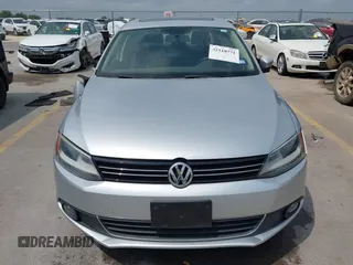 2012 Volkswagen Jetta TDI w/Premium & Nav with VIN 3VWLL7AJXCM359181, listed as a IAAI auction lot 42110771 with 148,547 mi miles and . Bid and sale history available at DreamBid. Image 13.